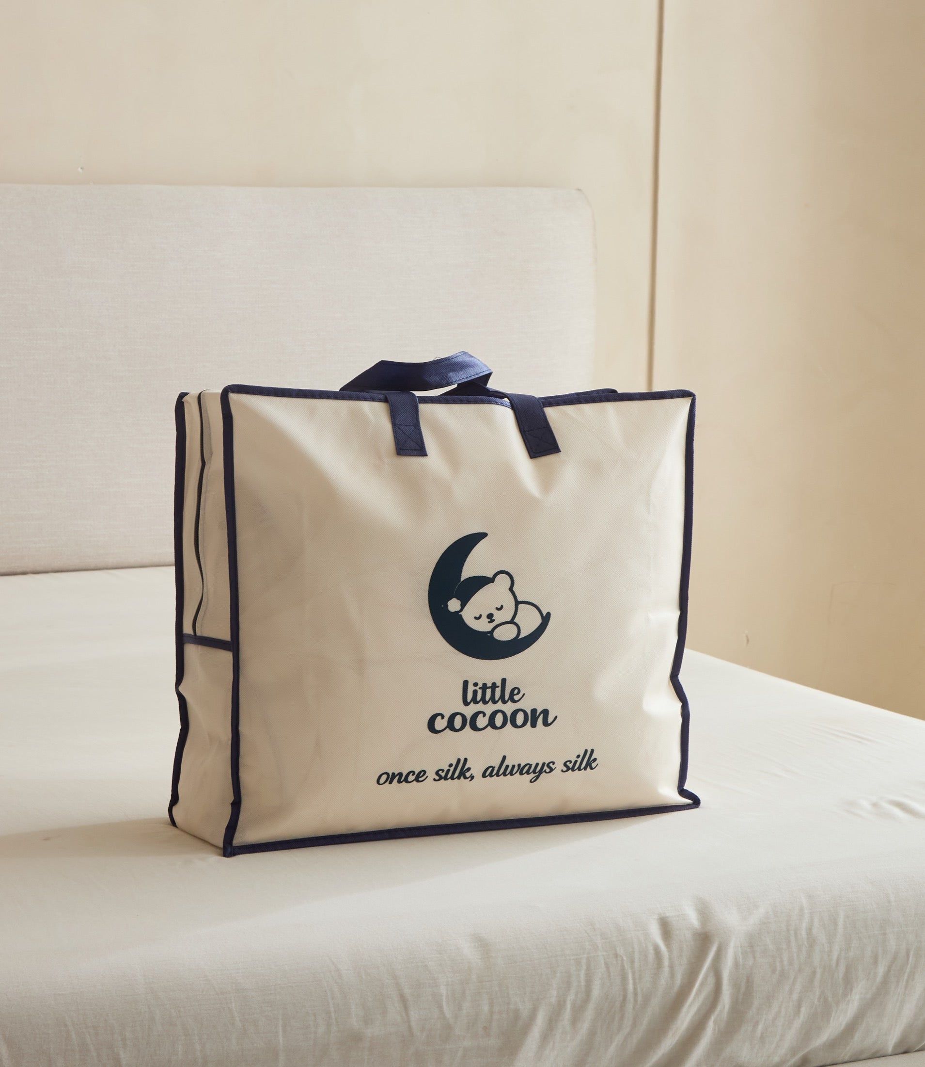 Little Cocoon silk duvet presented in signature reusable packaging